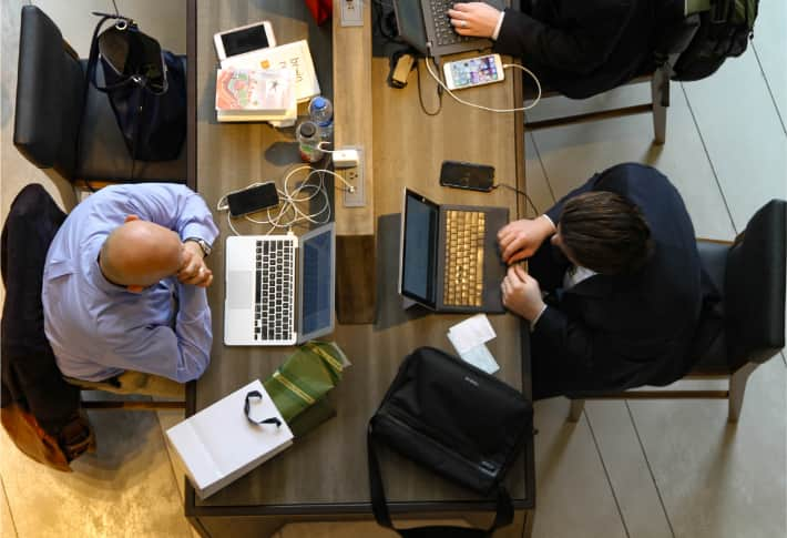 Two men working in a relaxed enviroment